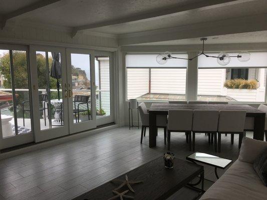 Installation of a modern dining chandelier