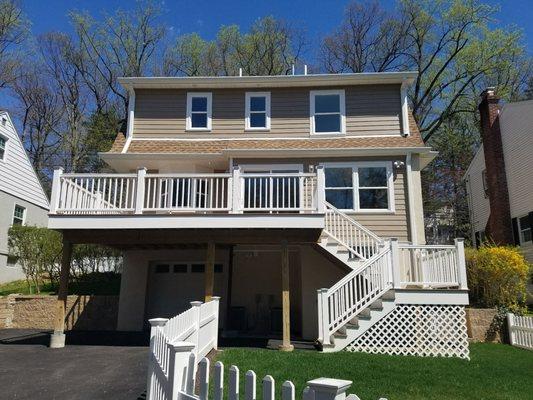 This project used to be a cape house we removed the roof and did a second floor addition and remodeled the entire interior.