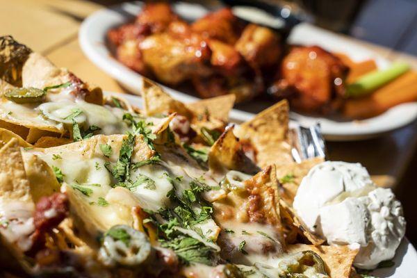 Wings and Nachos, two of our customer favorites, and great to share with the table.