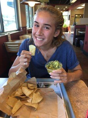 Enjoying chips and guacamole