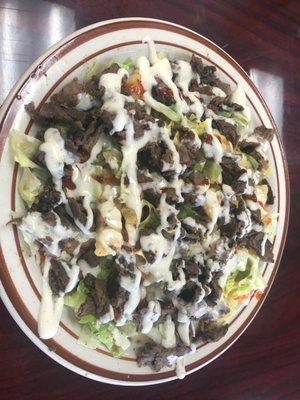 Lamb Rice Bowl Special served on a plate