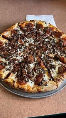 Pepperoni, Bacon, Mushroom Pizza