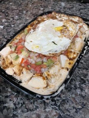 Large white rice bowl with Jerked Korean BBQ sauce, chicken, fried egg and pick de Gallo. This thing weighed like 5lbs