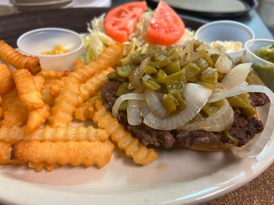 Juan Burger: Beef Patty, shredded cheese, onions, long green Chile, onions, Mayo, guacamole, mustard, lettuce, tomatoes, and fries