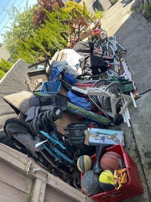 Stroller, tv, box spring, broken chairs, trampoline, lots of junk and trash