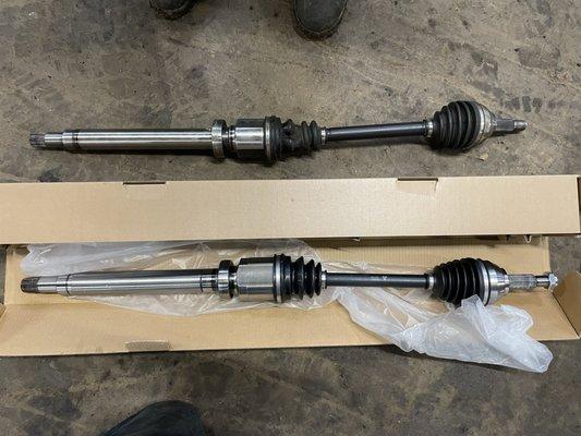 Detroit Axle CV Axle up top Duralast Gold Autozone CV Axle on bottom.