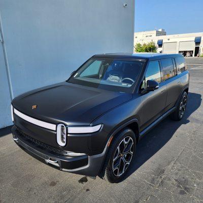 Satin Black wrapped Rivian