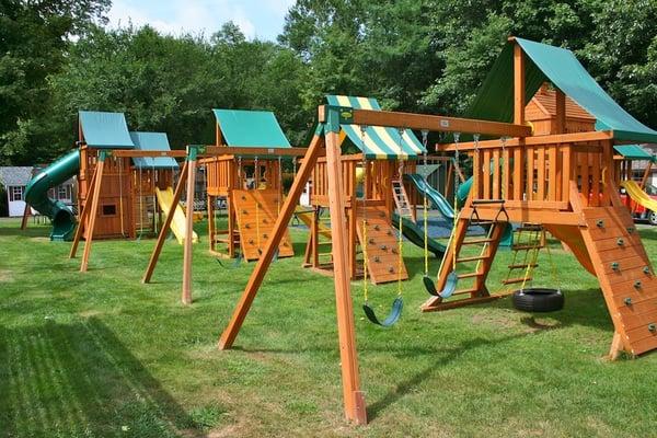 Best in Backyards in Cheshire, CT sells Eastern Jungle Gym's cedar swing sets, complete with plenty of activity and accessory options.