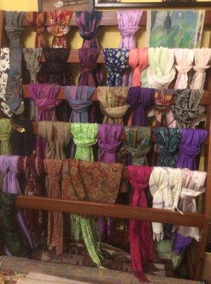 A rainbow of scarves and shawls to cozy up in.