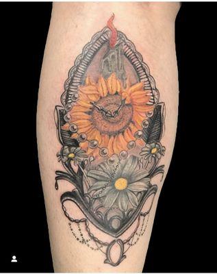 Sunflowers tattoo done by jesse