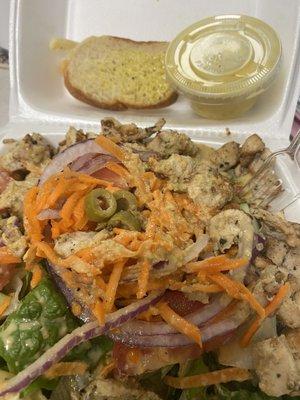 Grilled chicken salad and garlic bread