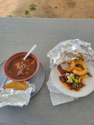 Beef stew/Birrira and Taco Al Pastor with some free condiments- grilled onions, grilled jalapeños, salsa