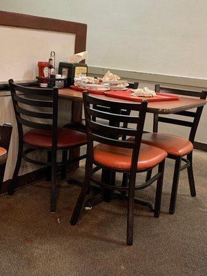 Once this abandoned table was stacked three plates higher, I had enough and changed seats.  Fine dining?  Hardly!