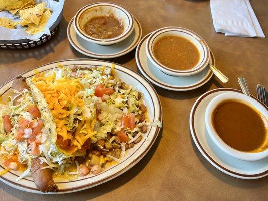 Lunch combo with Chile relleno, chicken enchilada and shredded beef taco. Christmas on the side.