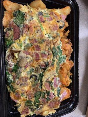 Omelette; Build your own $20. Comes with some kind of potato mixture.