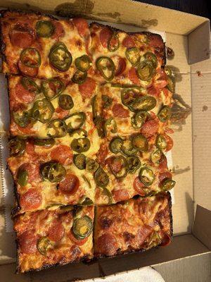 Sicilian pizza with pepperoni and pepperoni. It's like a Detroit-style, but disappointing