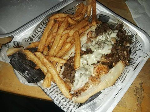 Philly Cheesesteak with Shrimp and side of fries. $15 approx. Worth every penny.