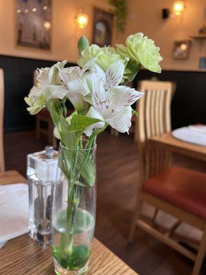 Fresh flowers on every table