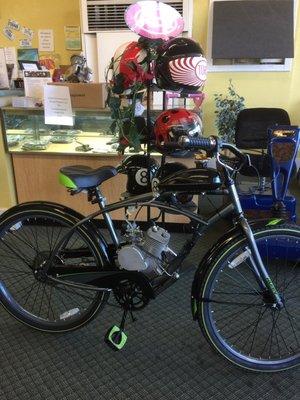 Complete Bicycle engine kit (box on the counter) installed on a bike  awesome!