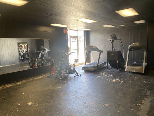 Posing room with cardio equipment.