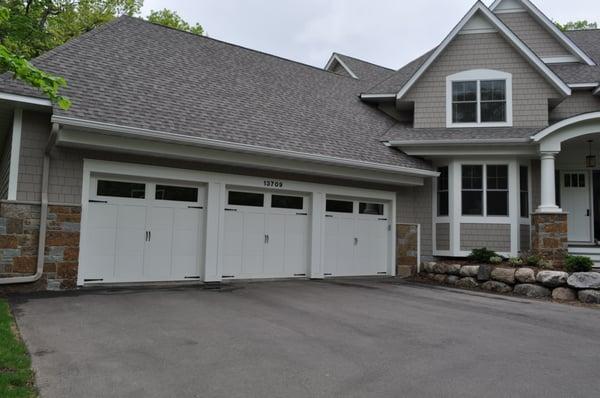 Beautiful carriage style doors by IDC-Automatic Garage Doors