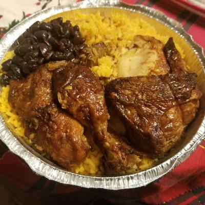 Rotisserie chicken half, with rice and beans