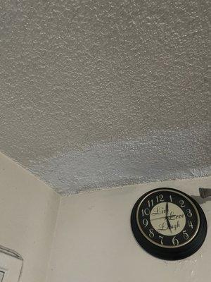 Popcorn ceiling and water damage from upstairs units.