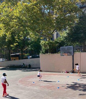 He's coaching two young female basketball players! Very good. 09/22/24