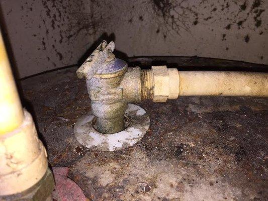 Water heater pressure relief valve is leaking water into the drain. Pressure relief valve will need to be replaced