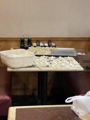 Food being made on the table in the dining room