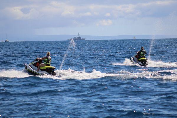 Mother and son jet skiing, Maui, October 2022