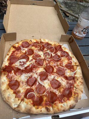 Pepperoni and onion pizza