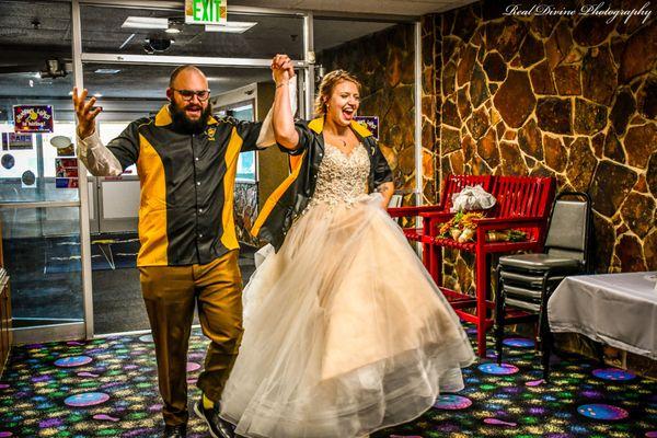 Bride and groom make one hell of an entry!