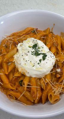 Penne with Vodka with Burrata 
 The center of burrata is filled with a mixture of cream and stracciatella,