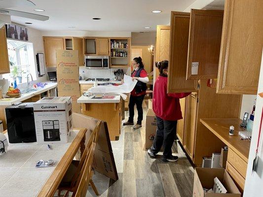 Packing up the kitchen, diningroom.