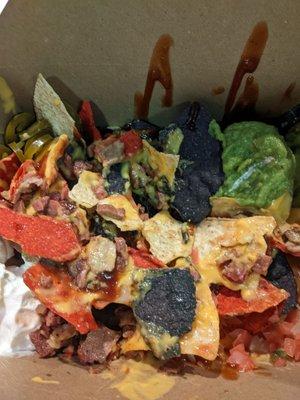 It is their pulled beef nachos. Served in a box.