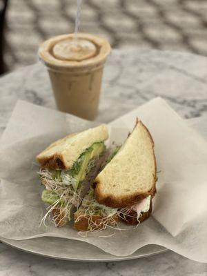 TURKEY AVOCADO SANDWICH!  Turkey, avocado, Ward's Berry Farm alfalfa sprouts, cucumbers, and green herb dressing on housemade challah.