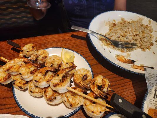 Skewered grilled shrimp with rice