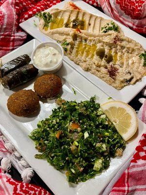 vegetarian sampler;
A combination sampler of falafel, hummus, baba ghanouj, tabouli and dolma. Served with pita bread