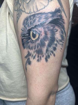 Designed this detailed black and grey owl tattoo! Loving the intricate feathers and that piercing yellow eye. What do you think?