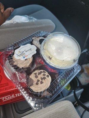 Stopped by to get dessert for the hubby and kids. Two chocolate and cookies and cream cupcakes and a cookie dough cheesecake.