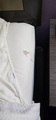 Black stains on one of the beds