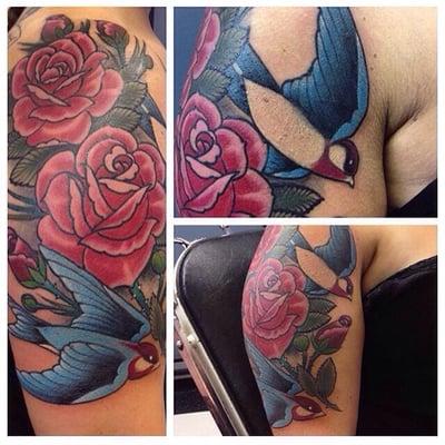 Traditional roses and swallows by Sean