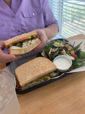 Turkey on Focaccia with a side salad.