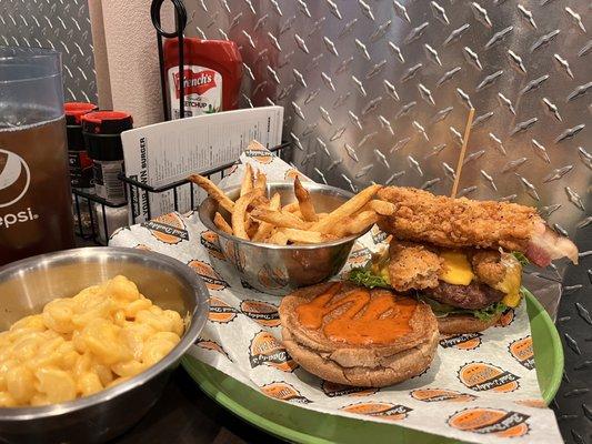 Buffalo burger with house made American cheese, buttermilk fried bacon, and Bad Daddy's sauce. Sides are fries and Mac and cheese.