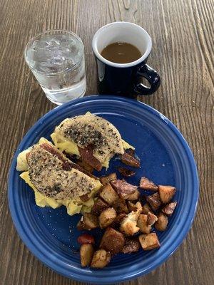 Everything bagel with thick cut bacon, egg, and cheese! Home fries have pieces of salt and garlic for that delicious crunch!