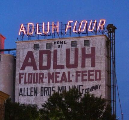 Flashing neon atop the Adluh grain elevator. A Columbia icon.