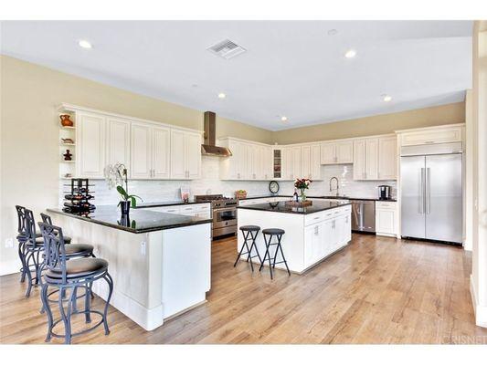 Beautiful Kitchen, waterproof flooring, quartz countertop, design was created by Victory Kitchen and Bath Inc.