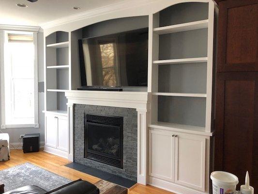 Newly remodeled fireplace and custom built-ins. Now we just have to decorate!