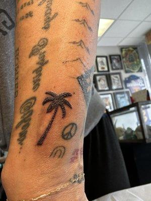 Palm tree tattoo by TJ